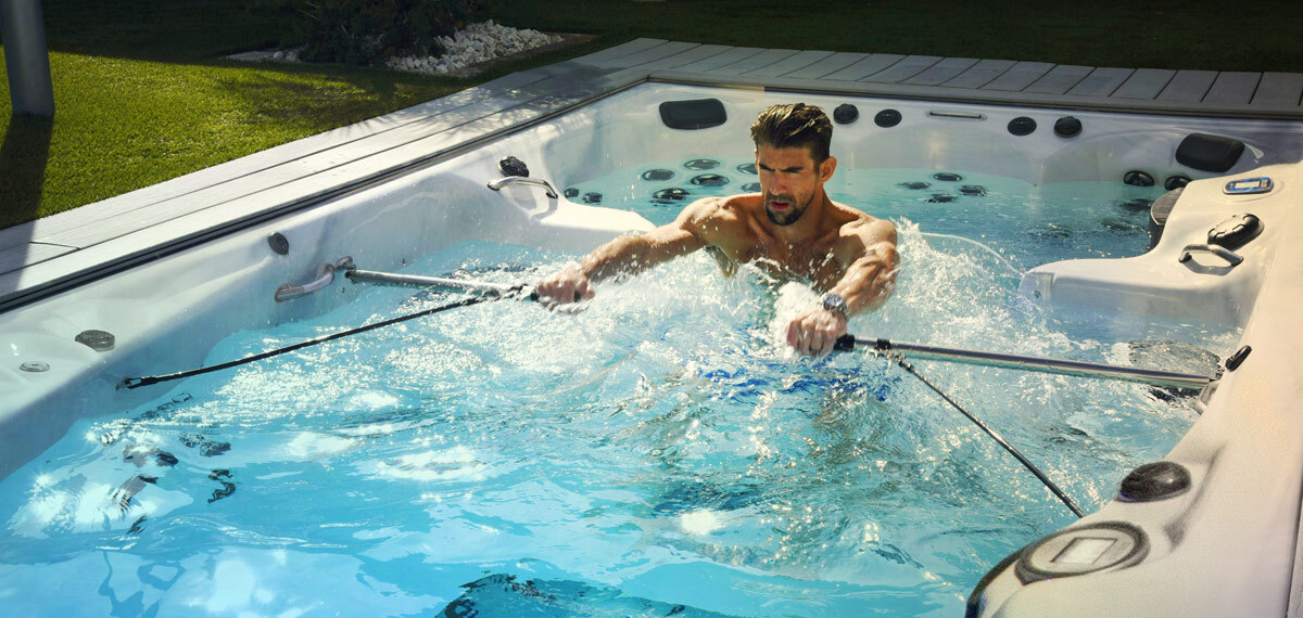 Phelps using h2xercise kit in a swim spa.