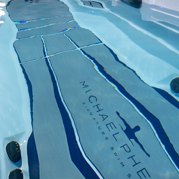 Nonslip comfort floor system on bottom of a MP Swim Spa.