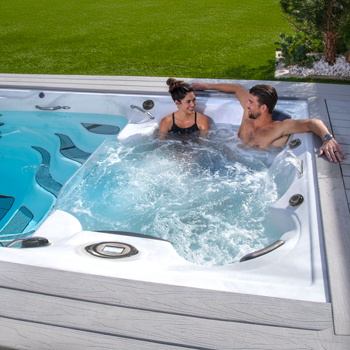 Michael Phelps and wife Nicole relaxing in a Momentum D Swim Spa.