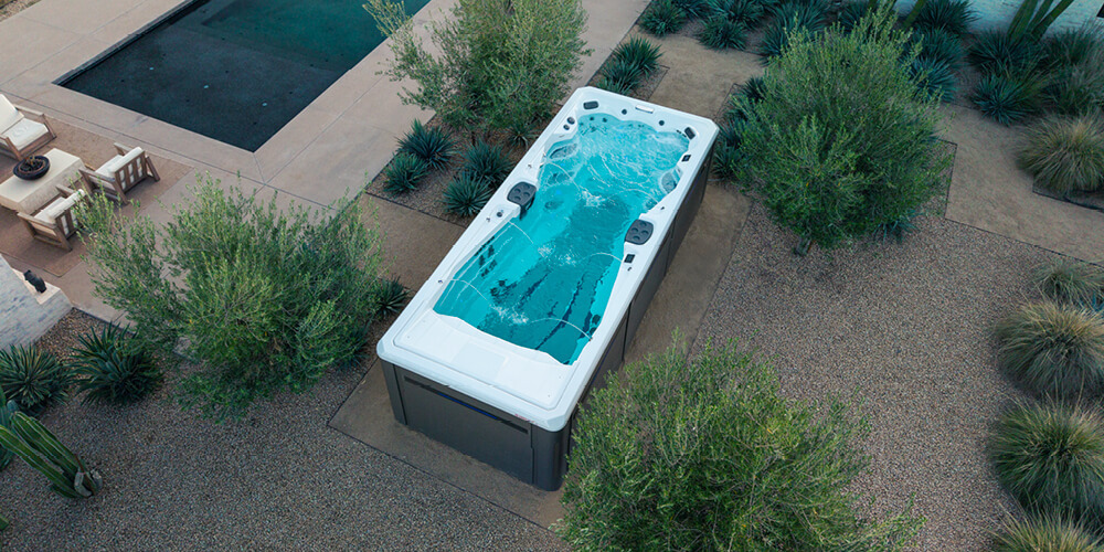 Drone shot of a Michael Phelps Signature Swim Spa.